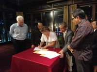 Pemkot Denpasar Fasilitasi PKS antara Kadin Denpasar dengan Chamber of Commerce Northern Territory Australia Penandatanganan Perjanjian Kerja sama
