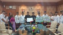 Jaya Negara Saksikan Penandatanganan Perjanjian Kerja Sama Antara Bank BPD Bali dengan Desa Adat Sanur dan Desa Adat Intaran Jaya Negara