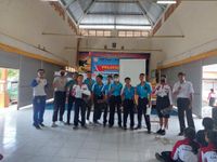 Tanamkan Budaya Tertib Berlalu Lintas dan Gunakan Helm Sebagai Upaya #Cari_Aman untuk Siswa SMK Negeri 1 Amlapura SMK Negeri 1 Amlapura