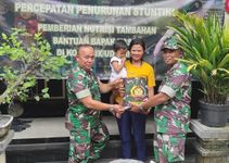 Kodim 1619/Tabanan Salurkan Paket Nutrisi Tambahan untuk Anak-anak Salurkan Paket Nutrisi