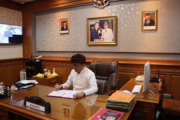 menandatangani kesepakatan bersama