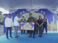 BRI Regional Office Denpasar Bagikan Ribuan Sembako kepada Masyarakat Sekitar Bank BRI Denpasar
