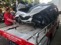 Peningkatan Penjualan Kendaraan dan Jasa Cuci Motor Jelang Tumpek Landep Kirim Motor