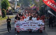 Ribuan Warga Susut Ikuti Jalan Sehat Meriahkan HUT Ke-80 RI Susut Jalan Sehat