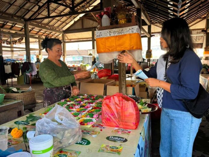 BaliPortalNews_ Pasar Mengwi Promo Semangat Baru Makin Berdaya, PLN ULP Mengwi Sapa Pelanggan di Pasar Putra Sedana Abianbase